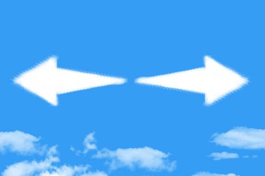 Arrow shaped cloud on blue sky