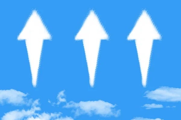 Arrow shaped cloud on blue sky