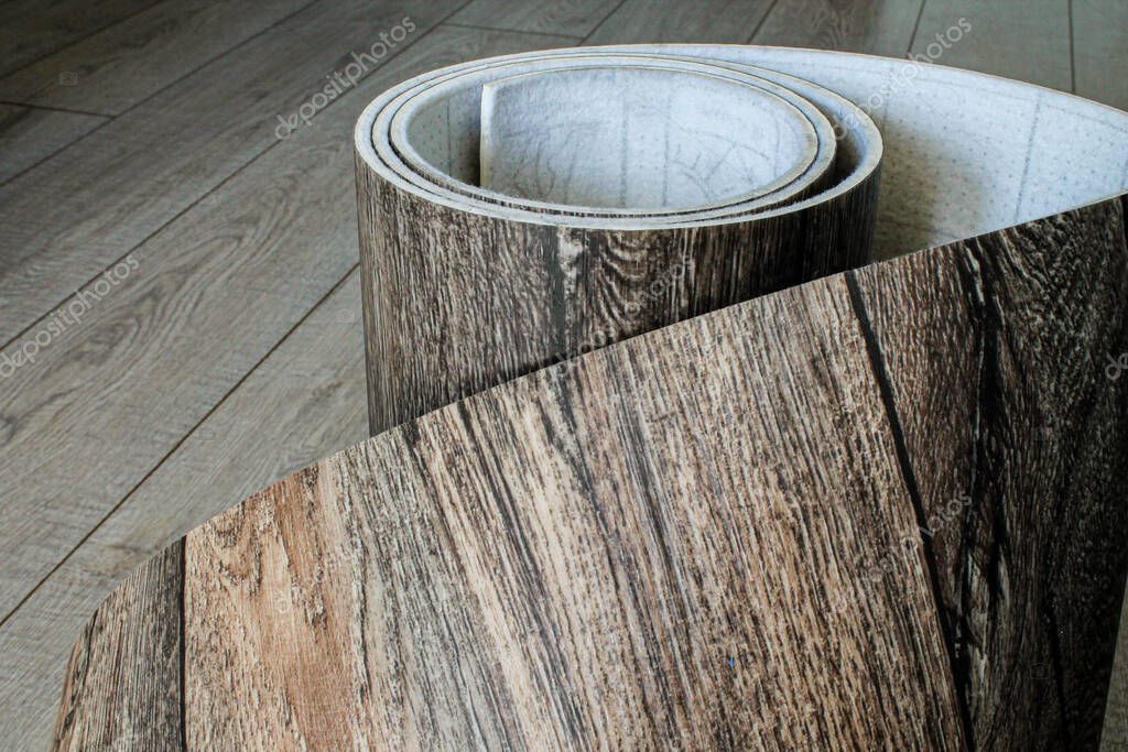 Rotolo di linoleum con una struttura in legno. Tipi di pavimenti . - Foto  Stock: Foto, Immagini © Verrone 366197434