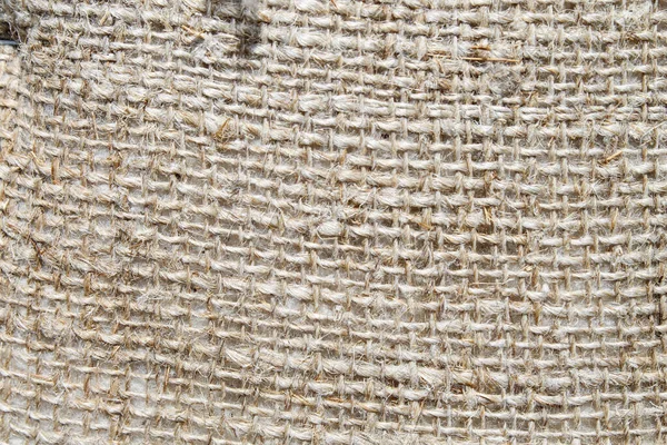 Burlap made from hemp. Coarse, durable fabric made from thick yarn. — Stock Photo, Image