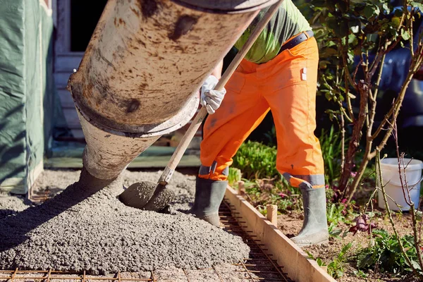 Concrete pouring during commercial concreting floors of building — Stock Photo, Image