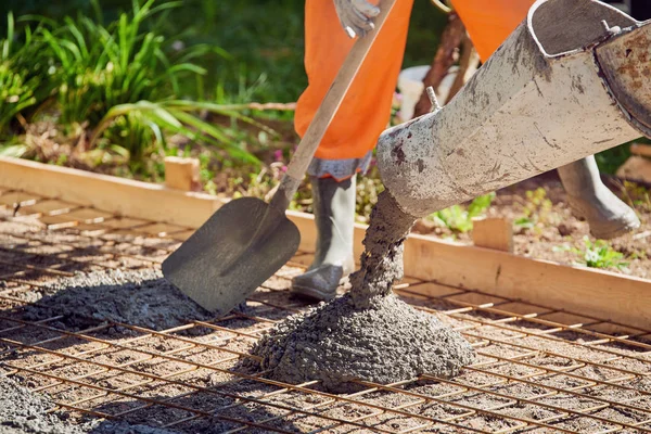 Concrete pouring during commercial concreting floors of building — Stock Photo, Image