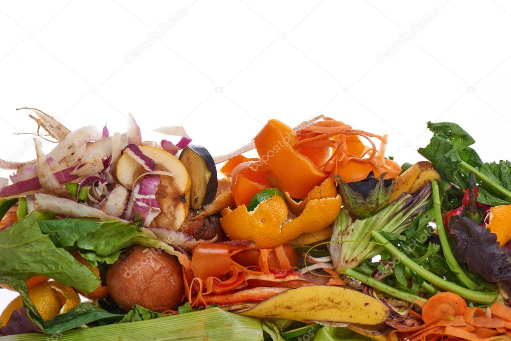 Domestic food waste for compost from fruits and vegetables on white background.