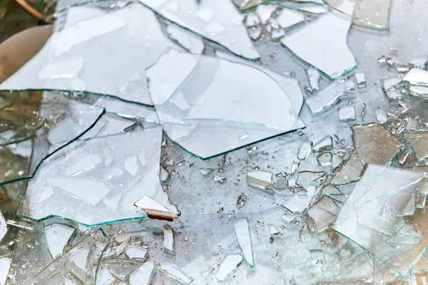 Recycling industry - Broken glass container.A closeup shot of a broken glass.