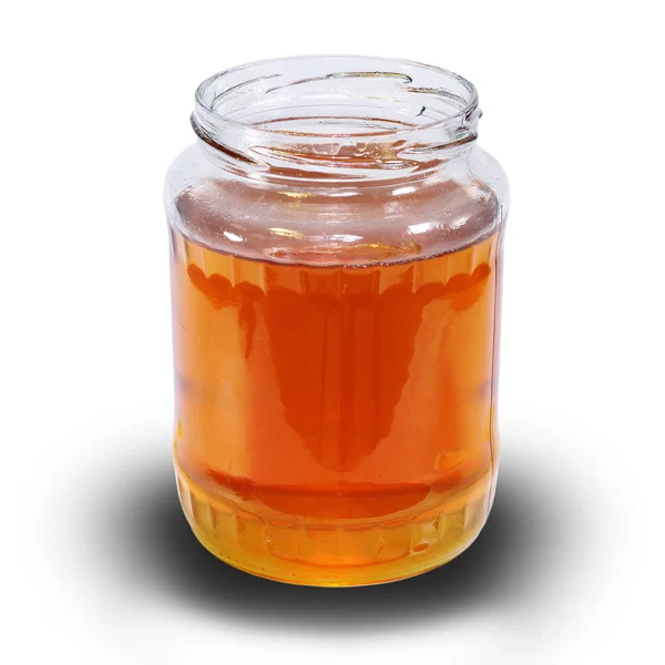 Honey jar over white with shadow Stock Photo