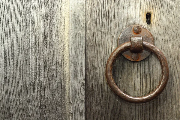 Ancient locker on wooden door — Stock Photo, Image