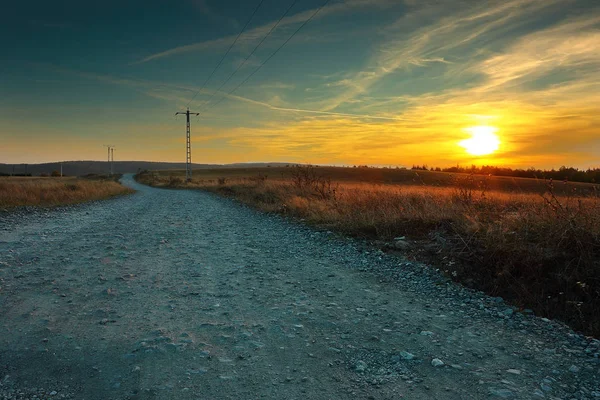 Strada rurale al tramonto — Foto Stock