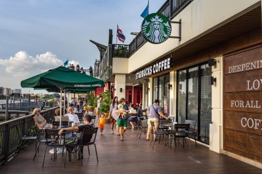 BANGKOK, THAILAND - SEPTEMBER 17, 2016: Starbucks coffee shop ri clipart