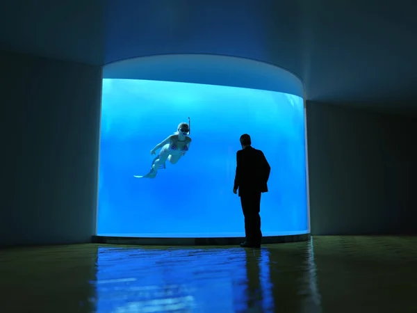Mann Blickt Durch Unterwasserfenster Ins Meer — Stockfoto