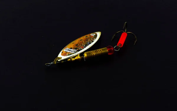 An exhibition of pirated copies of fishing metal spoon baits. Ba — Stock Photo, Image