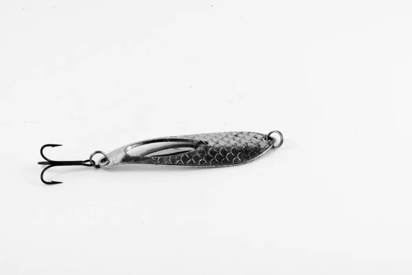 An exhibition of pirated copies of fishing metal spoon baits. — Stock Photo, Image