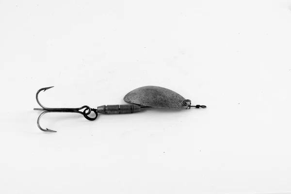 An exhibition of pirated copies of fishing metal spoon baits. — Stock Photo, Image