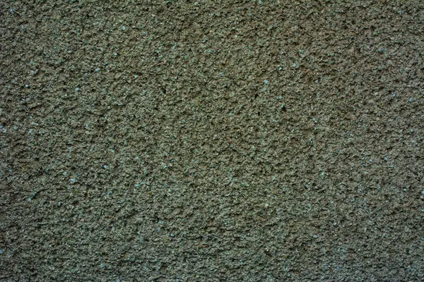 Green gypsum plaster, concrete wall, chaotically oiled texture. — Stock Photo, Image