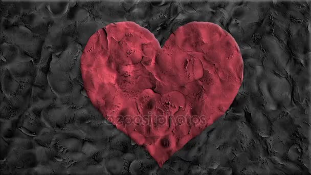 Zastavení pohybu clay udělal kreslený tvar srdce ručně vyráběné jako animace tok dokumentů smyčky - nové kvalitní romantické svatební symbol video záběry — Stock video