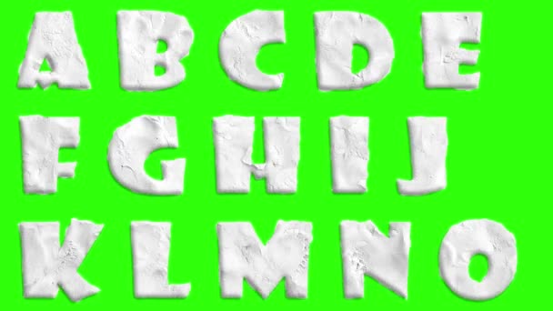 Animierte Tonschrift isoliert auf Chroma Key Green Screen Hintergrundanimation alle Buchstaben, Satzzeichen und Zahlen - neue Qualität dynamische Karikatur freudige bunte Knetmasse — Stockvideo