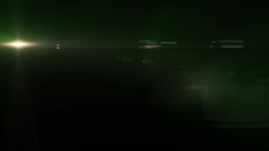 Yatay hareketli yeşil ışık optik lens parlak animasyon sanat arka plan animasyon fişekleri - yeni kalite doğal aydınlatma lamba parlak etkisi dinamik renkli tatil parlak video görüntüleri ışınları