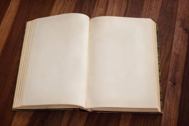 Açık boş eski kitap ahşap arka plan