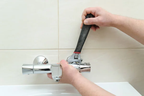 Installing faucet with thermostat. — Stock Photo, Image