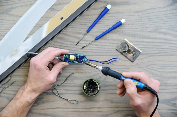 Repairing the power supply. — Stock Photo, Image