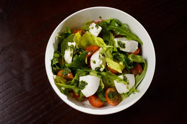 Salad with eggs, tomatoes and grilled chicken in a plate Royalty Free Stock Photos