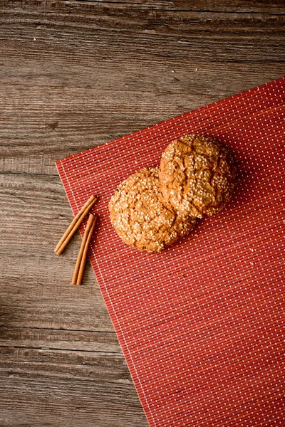 Round cookie with sesame seeds. Selective focus.
