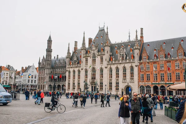 The provincial court building on the Market square in Bruges on a cloudy day