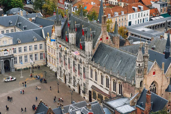 The provincial court building on the Market square in Bruges on a cloudy day