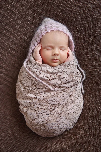 Amazing newborn baby sleeping beauty enjoying first days in her his life in luxury tender clothes and blankets made by couturier