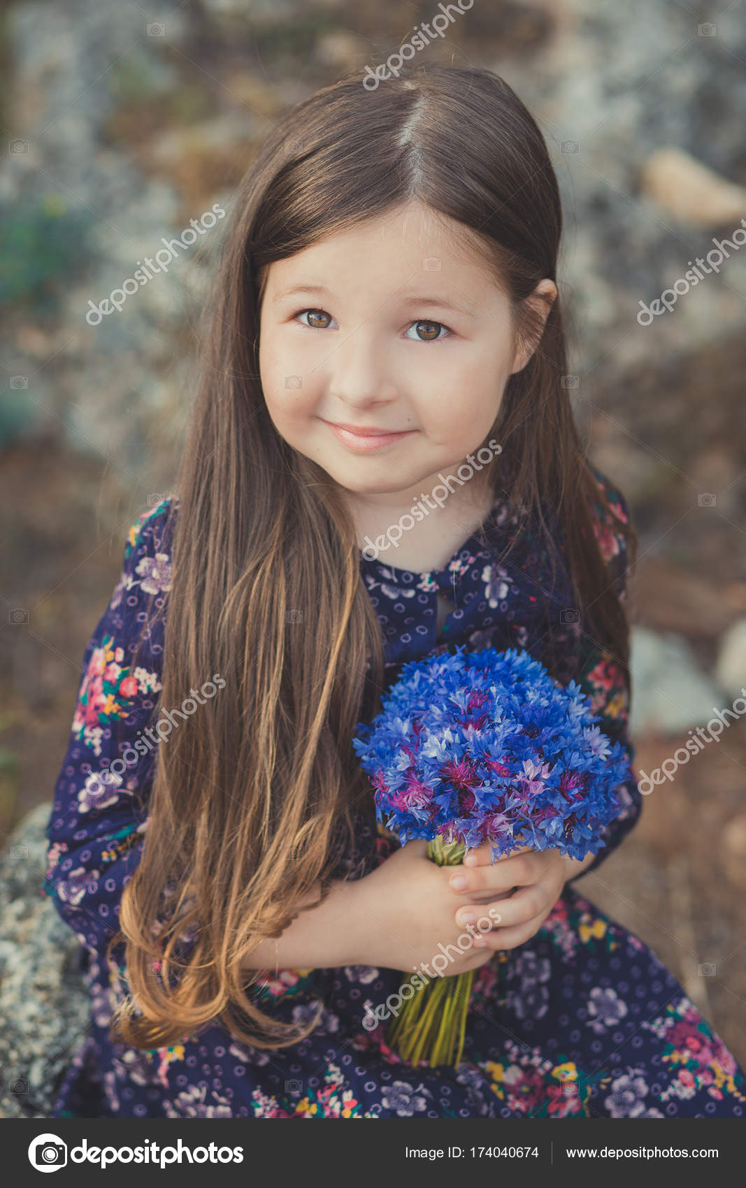 Cute Baby Girl With Brunette Hair And Brown Eyes Portrait With