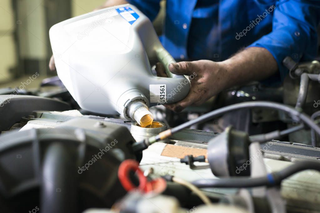 Car servicing, oil and filter replacing maintenance