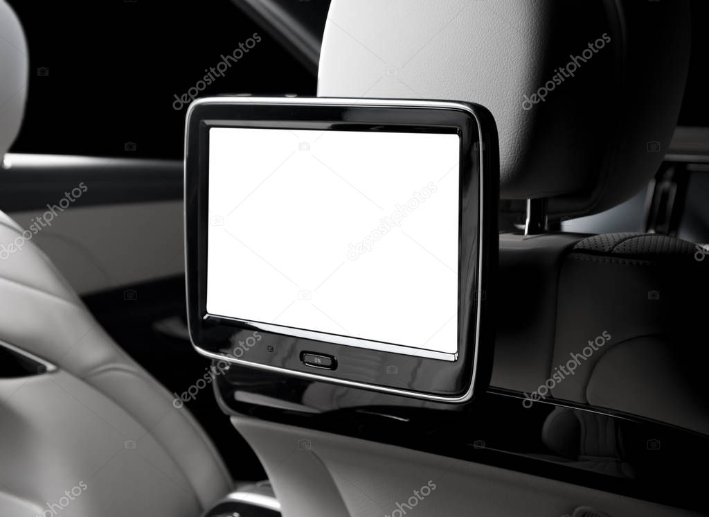 Car back seats with displays, isolated, copy space.