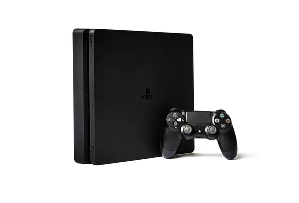 Sony PlayStation 4  and game controller on white background — Stock Photo, Image