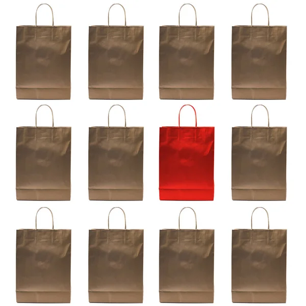 Paper bags pattern with one red colored in the center — Stock Photo, Image