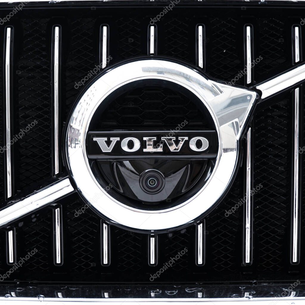 Sankt-Petersburg, Russia - February 08, 2019 VOLVO V90CC, front-side view. Macro view of Volvo Cars Manufactury logo. Test-drive of new Volvo.