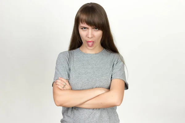 Mujer muestra lengua —  Fotos de Stock