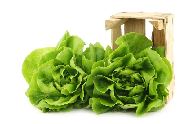 Fresh lettuce in a wooden crate — Stock Photo, Image