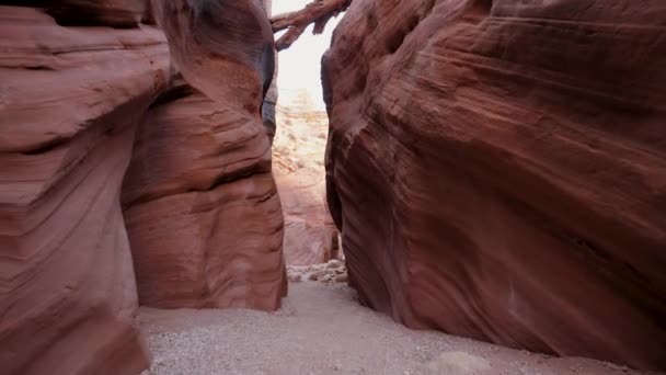 Movement In Slot Canyon With Wavy And Smooth Sandstone Walls Bright Orange — Stock Video