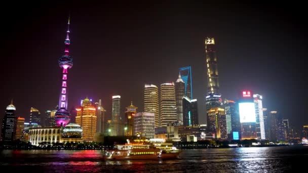 Shanghai, China - May 21, 2019 Financial Center with Skyscrapers In Illumination — стоковое видео