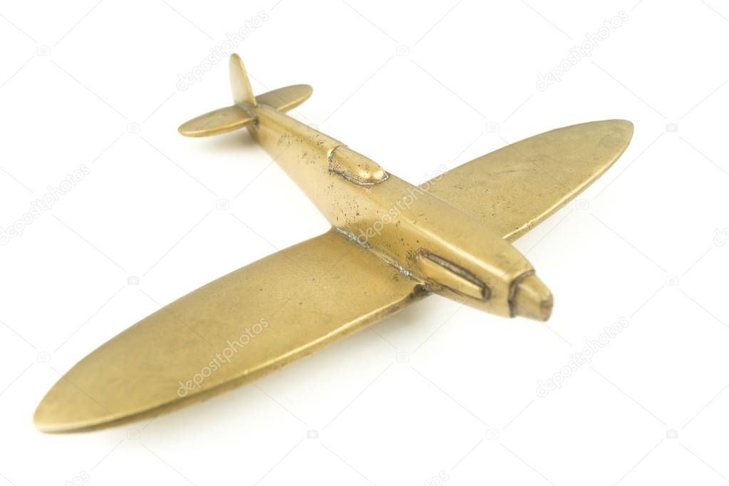 Vintage toy airplane made from brass