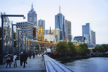Walking through Melbourne city center. March 2015. clipart