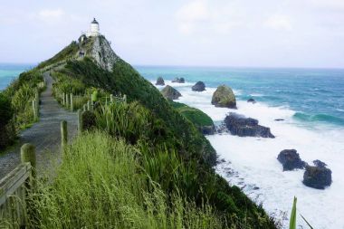 Nugget Point Lighthouse, South Island, New Zealand  clipart