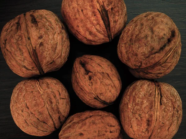 Walnuts on a table in contrast colors — Stock Photo, Image