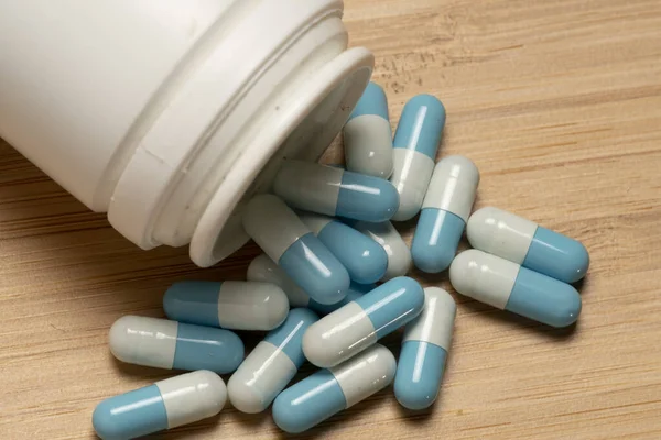 Blue White Pills Spilling Bottle — Stock Photo, Image