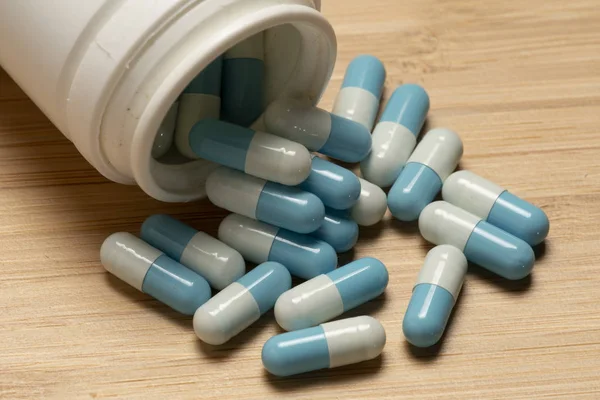 Blue White Pills Spilling Bottle — Stock Photo, Image