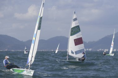 Rio, Brezilya - 12 Ağustos 2016: Xu Lijia (Chn) Rio 2016 Olimpiyat Oyunları sırasında Marina da Gloria, Guanabara Körfezi 'nde düzenlenen Laser Kadınlar kategorisinde