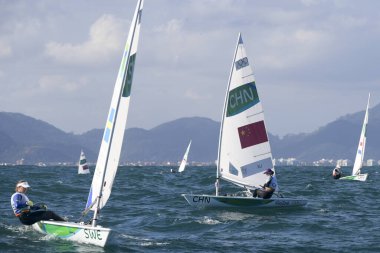 Rio, Brezilya - 12 Ağustos 2016: Xu Lijia (Chn) Rio 2016 Olimpiyat Oyunları sırasında Marina da Gloria, Guanabara Körfezi 'nde düzenlenen Laser Kadınlar kategorisinde