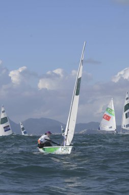 Rio, Brezilya - 12 Ağustos 2016: Xu Lijia (Chn) Rio 2016 Olimpiyat Oyunları sırasında Marina da Gloria, Guanabara Körfezi 'nde düzenlenen Laser Kadınlar kategorisinde