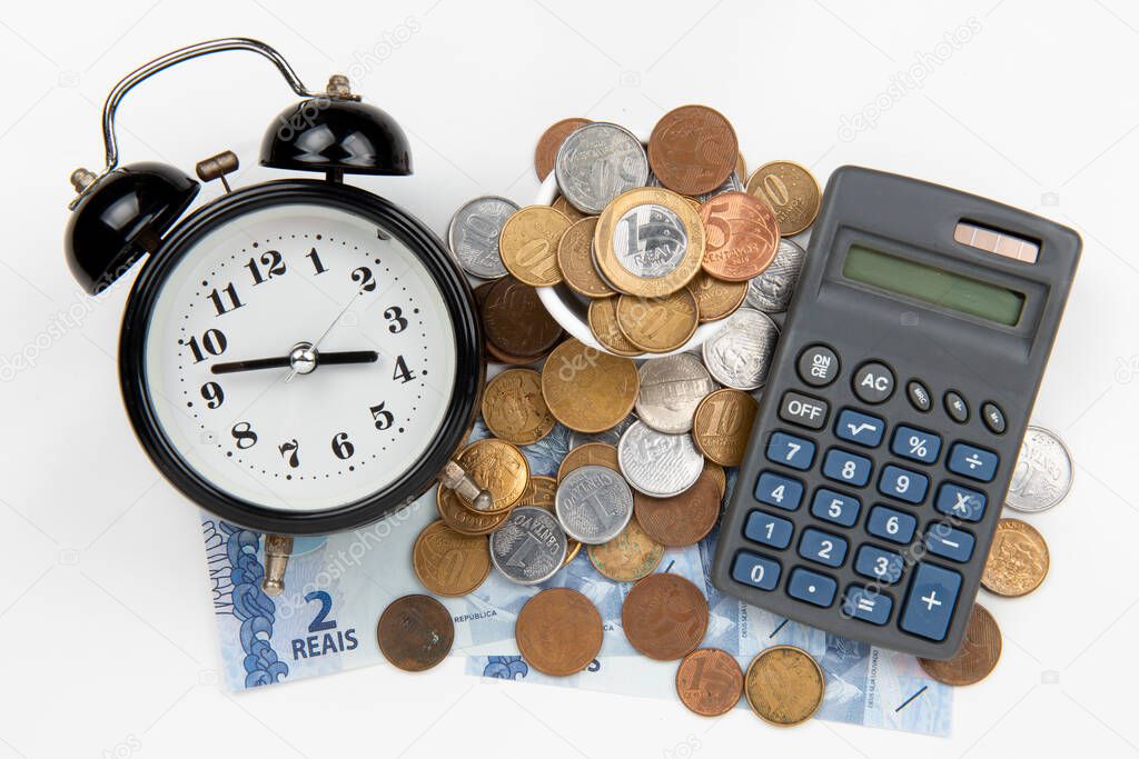 bill payment time. Financial elements with clock on white background. Hard times