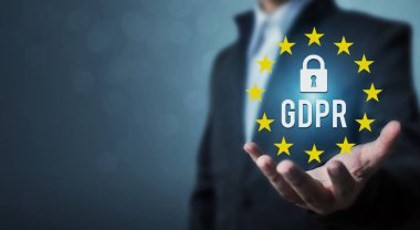 Businessman hand holding sign general data protection regulation (GDPR) and key icon