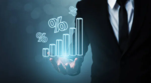 Interest rate financial and mortgage rates concept. Businessman hand show icon percent 3d sign with graph indicator